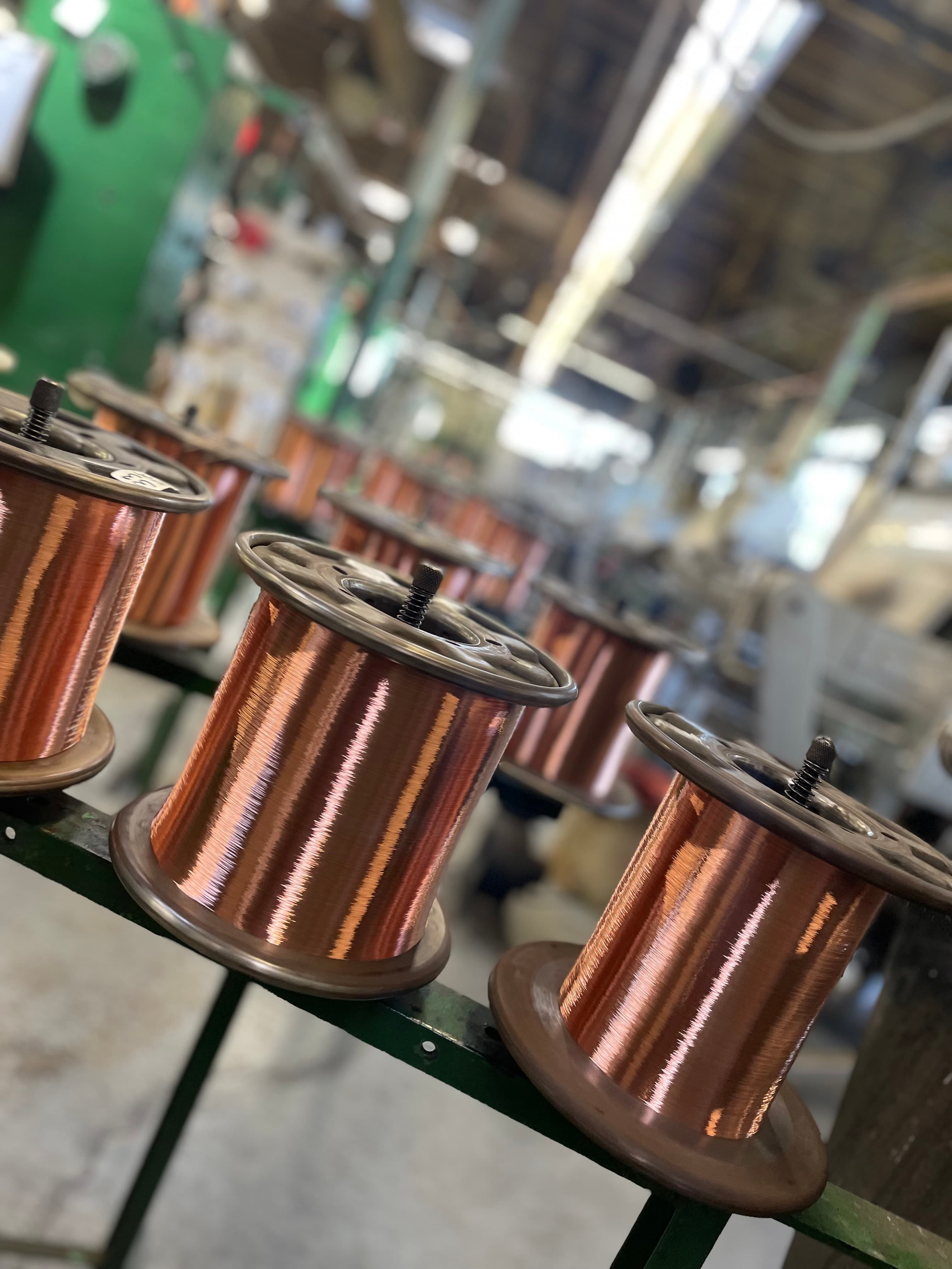 Wire spools at Bridgeport Insulated Wire manufacturing facility